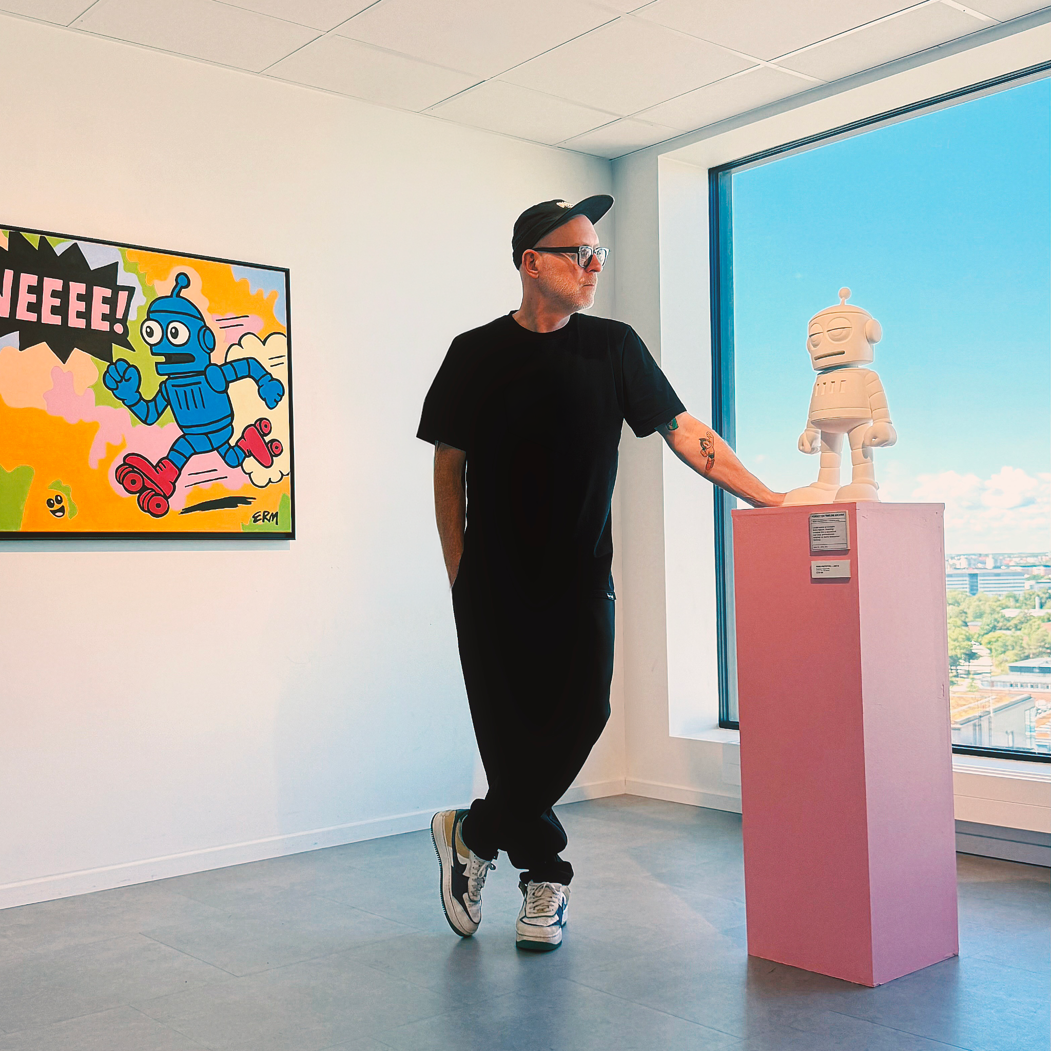 ERM with his painting and Robo Prototype sculpture